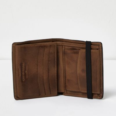 Tan leather foldout wallet